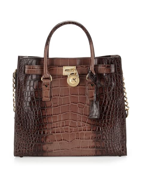 michael kors white and brown tote|Michael Kors embossed tote.